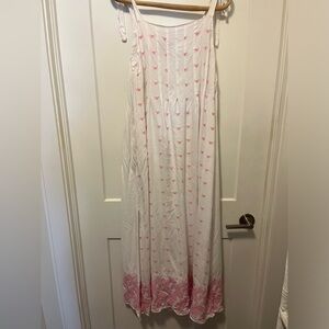 The yellow hanger white and pink embroidered dress